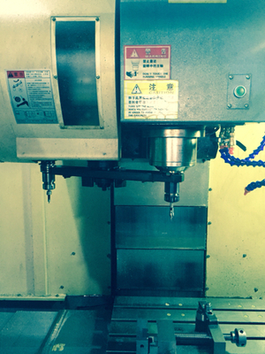 CNCM70加工中心换刀时刀被按到手动导致刀臂卡住怎么复位?_360问答